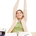 woman stretching in chair